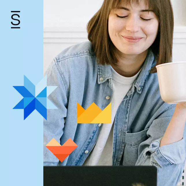 Employee recognition - smiling woman holding coffee cup while using laptop computer